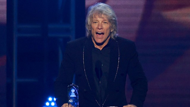 Jon Bon Jovi speaks on stage during the 2024 MusiCares Person of the Year gala at the LA Convention Center