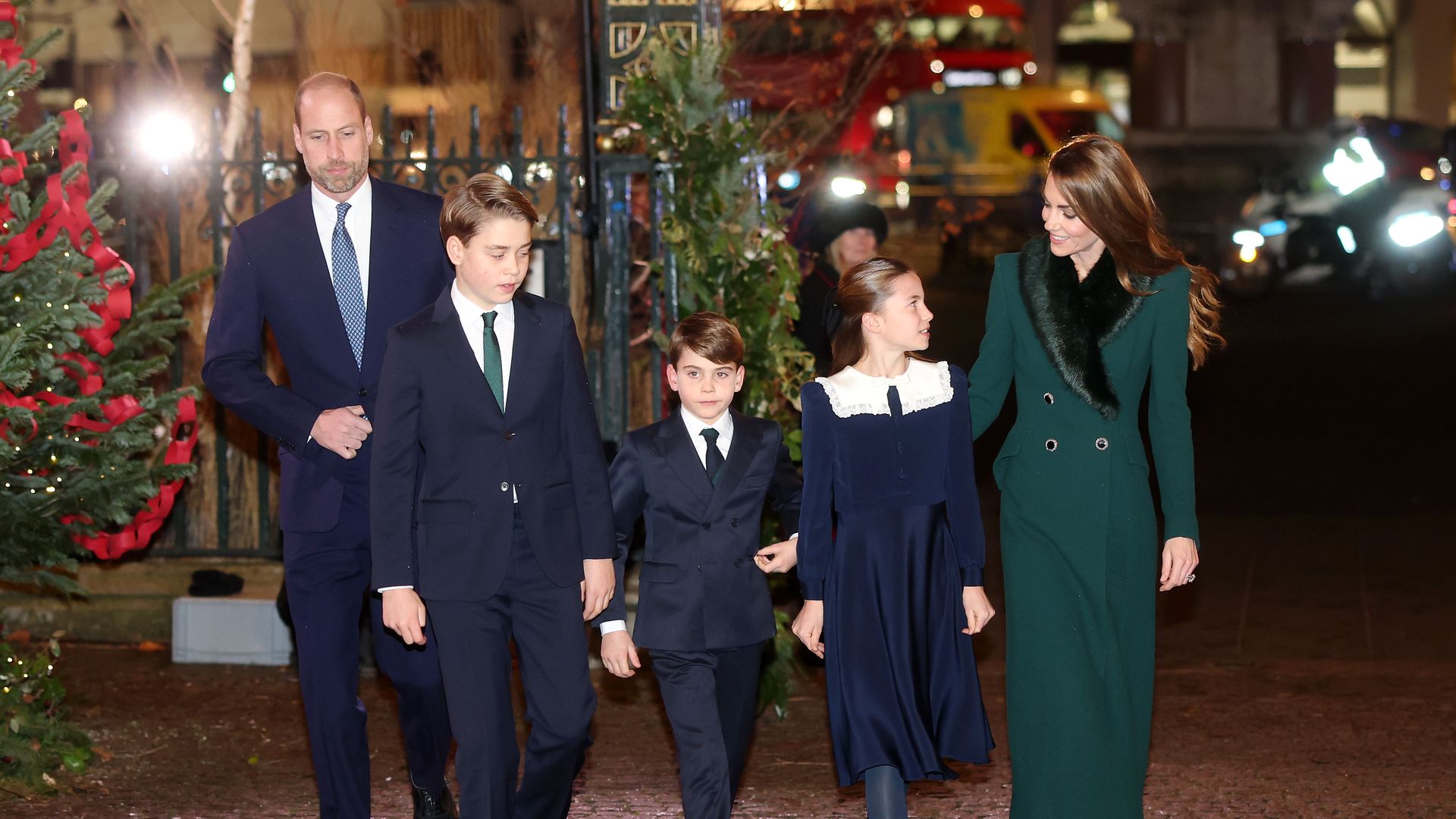 Prince George, Princess Charlotte and Prince Louis are Kate's perfect little helpers at carol service