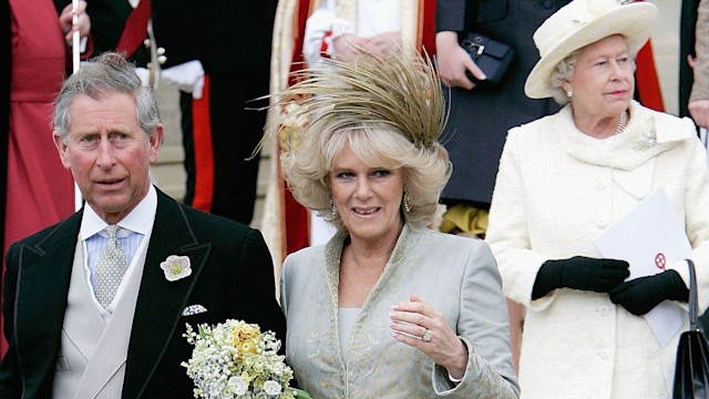 Prince Charles and Camilla Parker Bowles walk ahead of Queen Elizabeth II on their wedding day