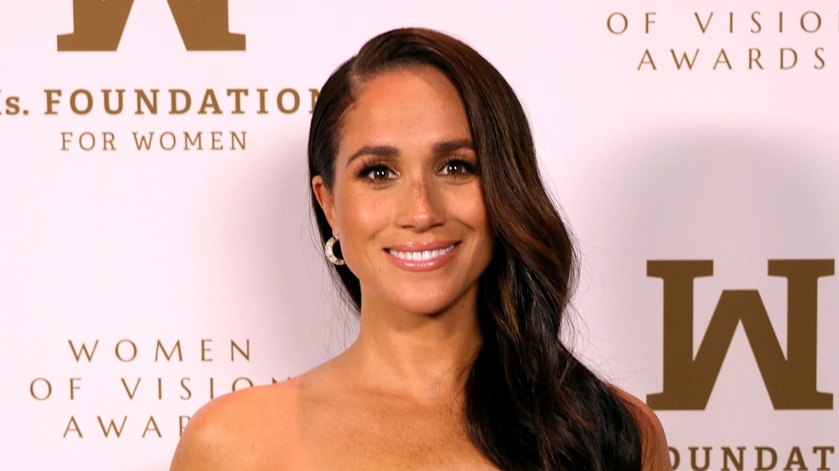 Duchess Meghan defies expectations in glamorous gold dress to receive epic award