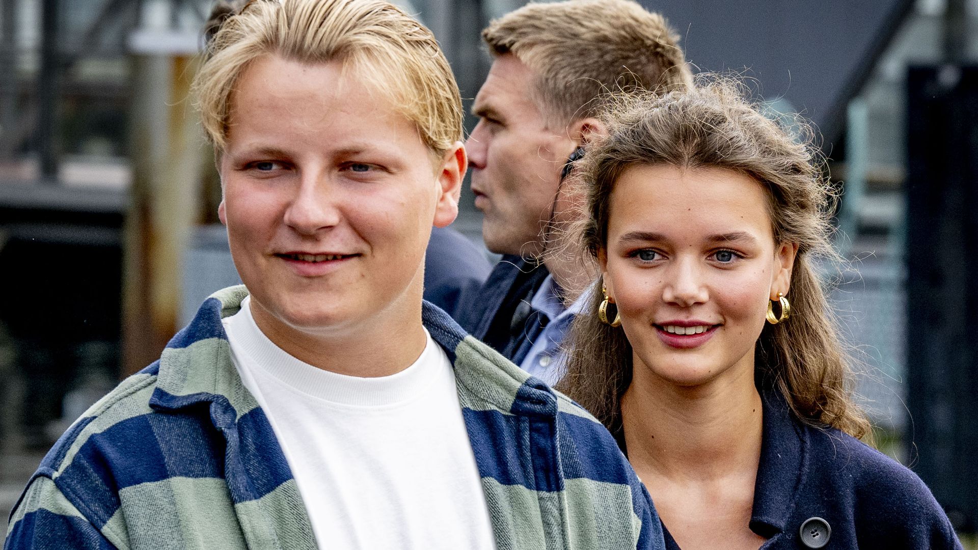 Crown Princess Mette-Marit's son Prince Sverre pictured hand-in-hand with reported girlfriend at Norwegian wedding