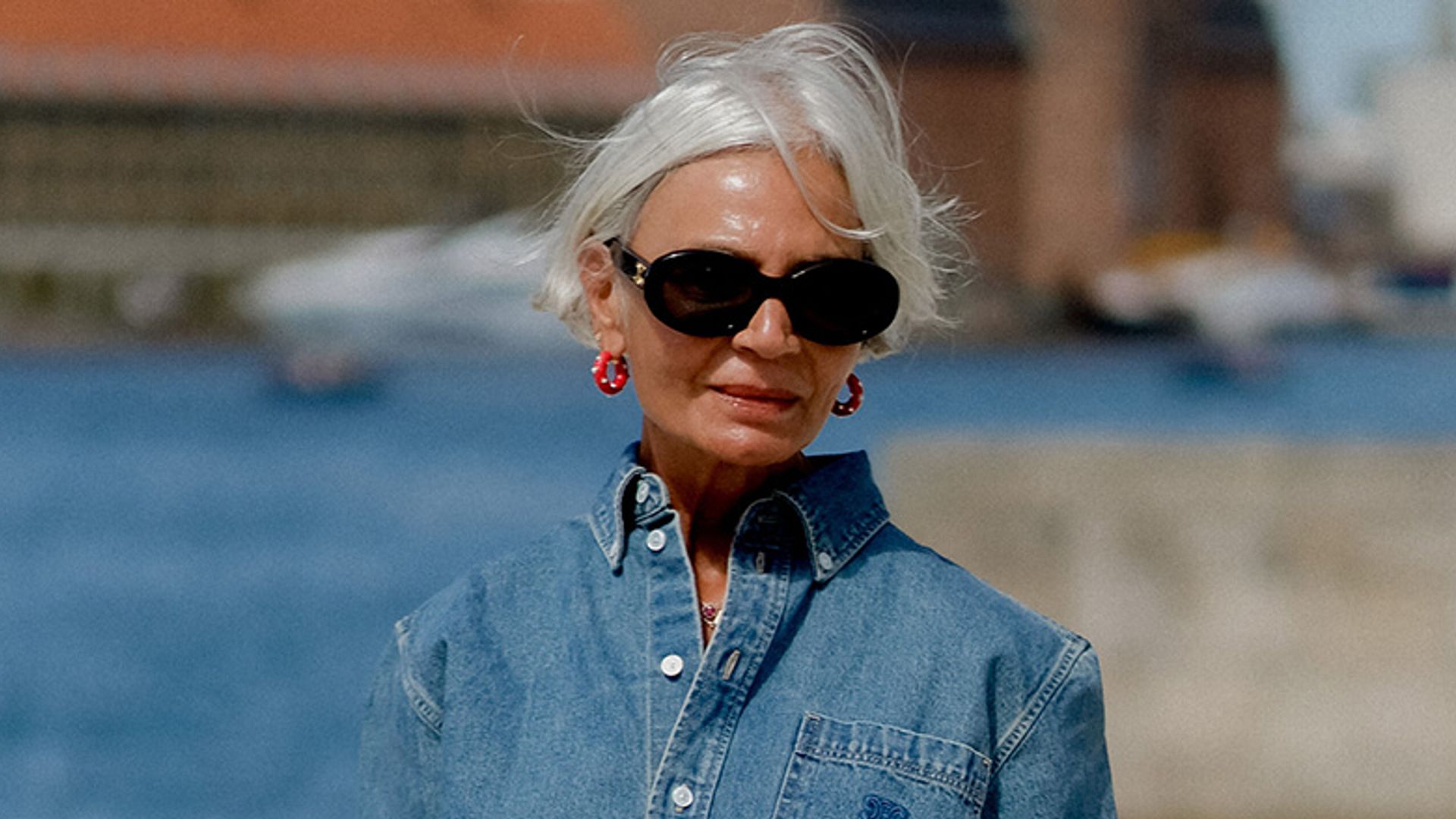 Denim shirt street style worn with zebra trousers