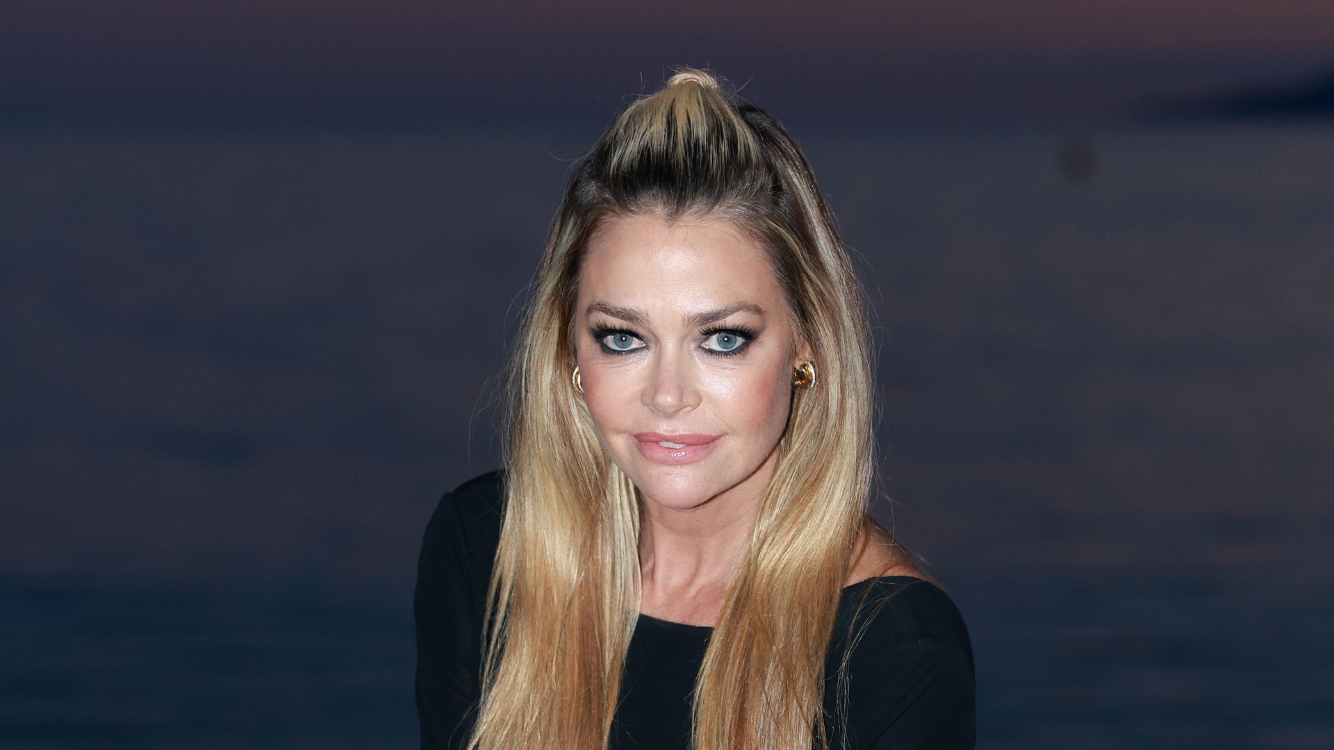 Denise Richards attends the "Paper Empire" Tv Show Event at Annex Beach in Cannes
