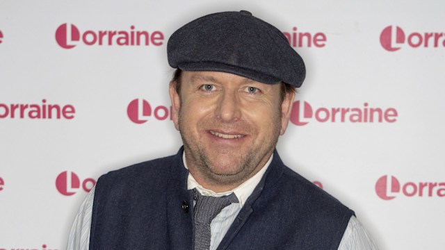 James Martin in a flat cap and waistcoat