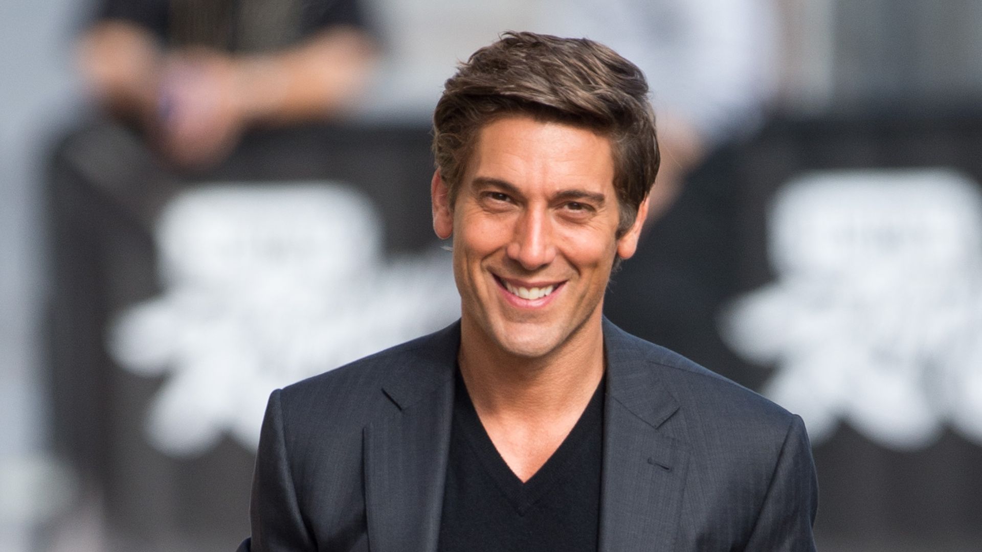 David Muir lets loose during holiday party with co-stars and rival ...