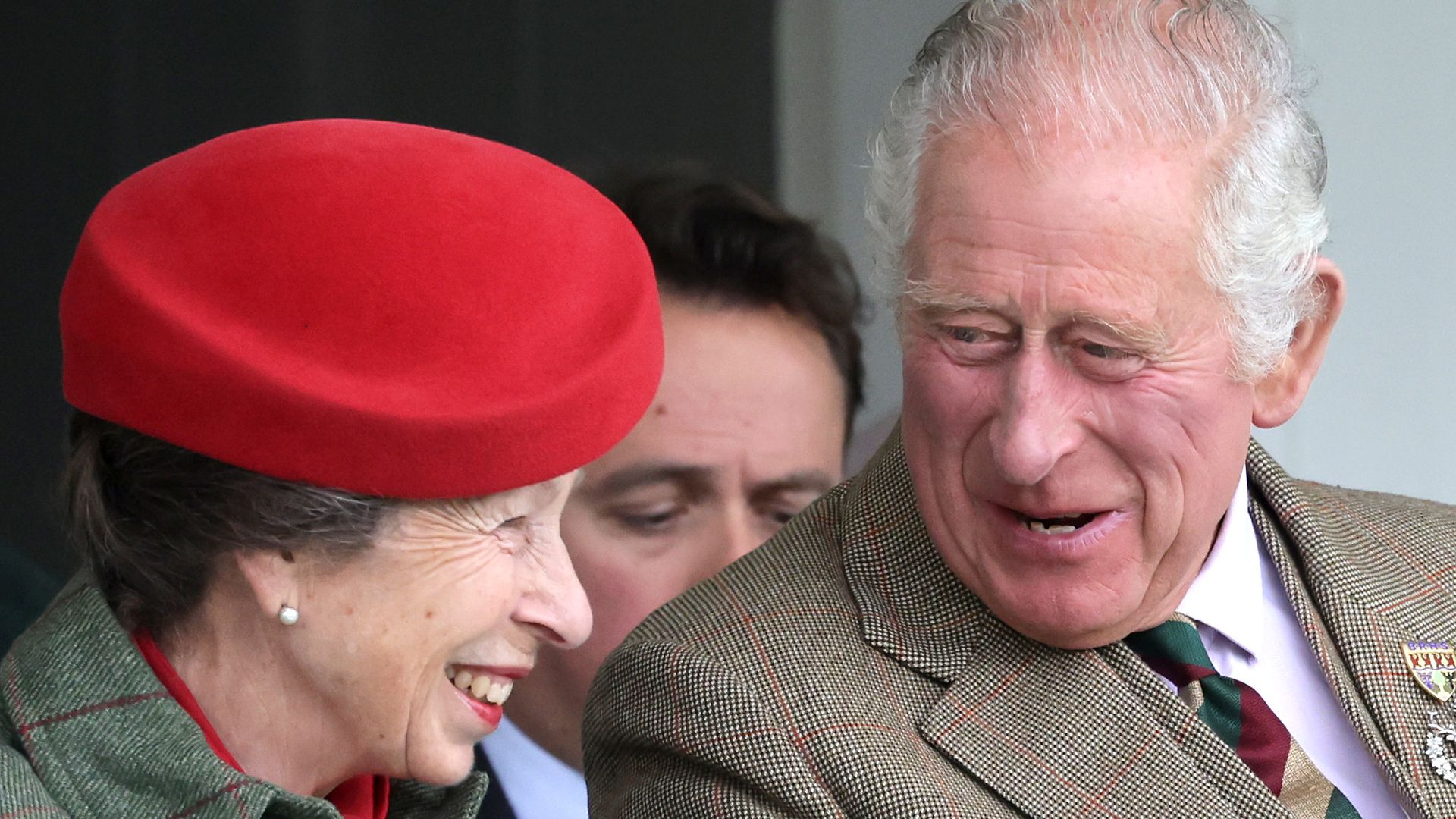 Princess Anne laughing with King Charles