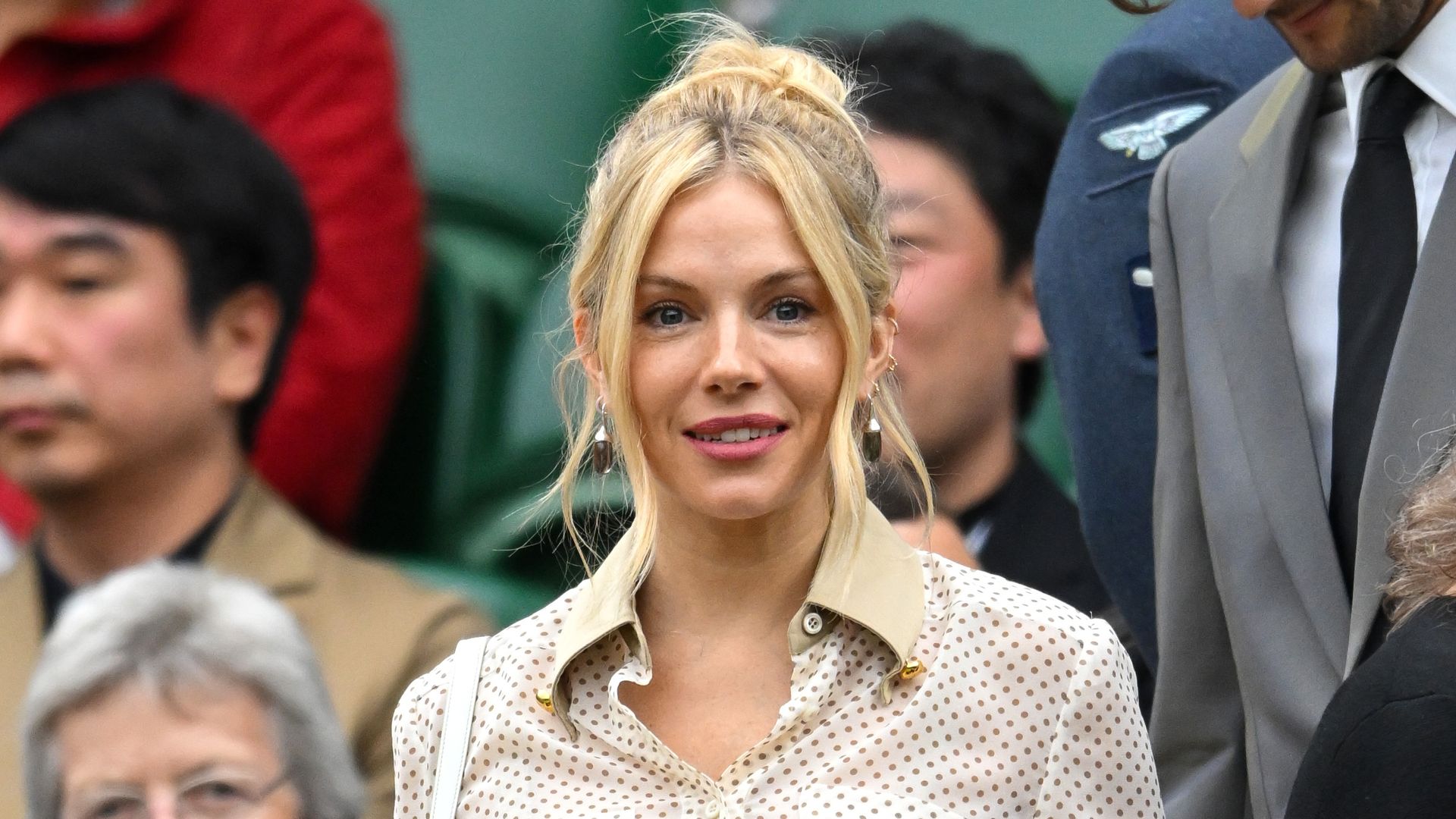 Sienna Miller serves Wimbledon elegance in Prada crop top and skirt set