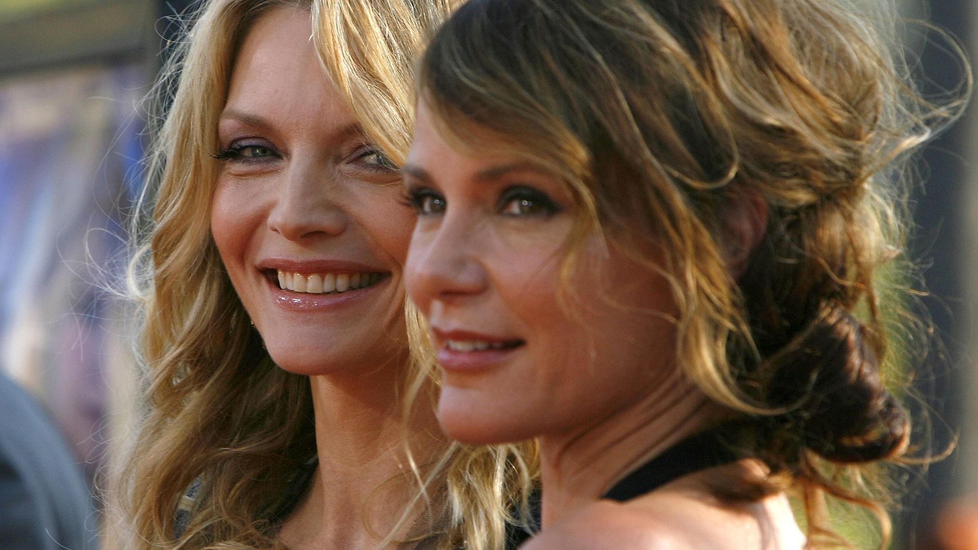 Michelle Pfeiffer and her sister actress Dedee Pfeiffer arrive at the premiere of Paramount Pictures' "Stardust" at the Paramount Studio Theater on July 29, 2007 in Los Angeles, California.  (Photo by Charley Gallay/Getty Images)