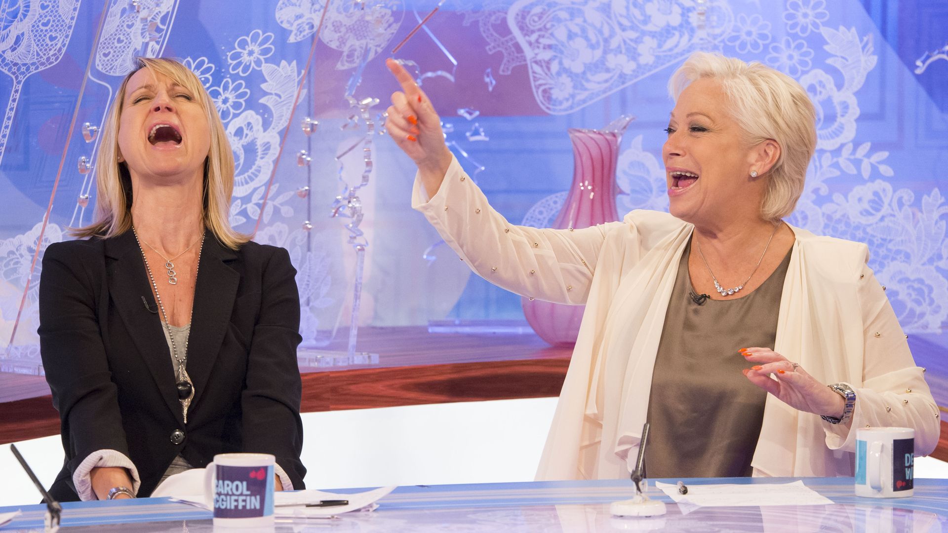 Carol McGiffin and Denise Welch laughing on Loose Women