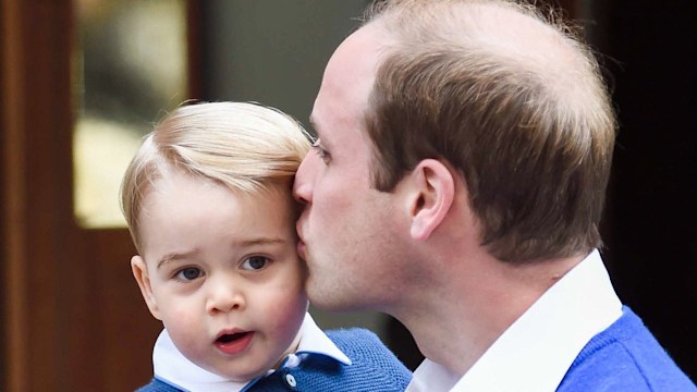 William kisses Prince George