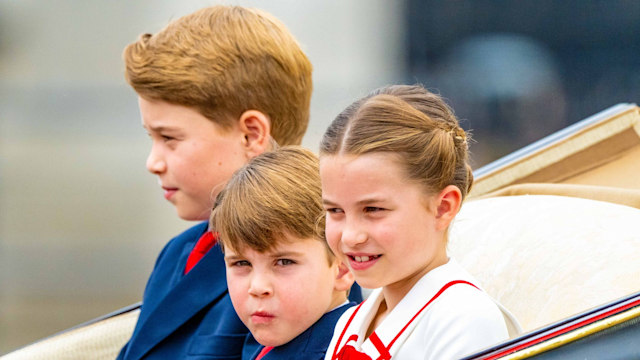 three children in carriage 