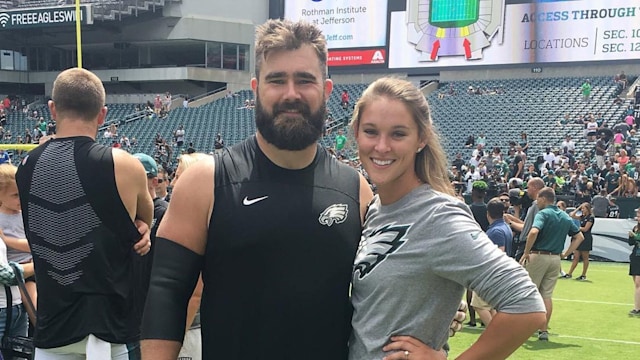 jason and kylie kelce on football field