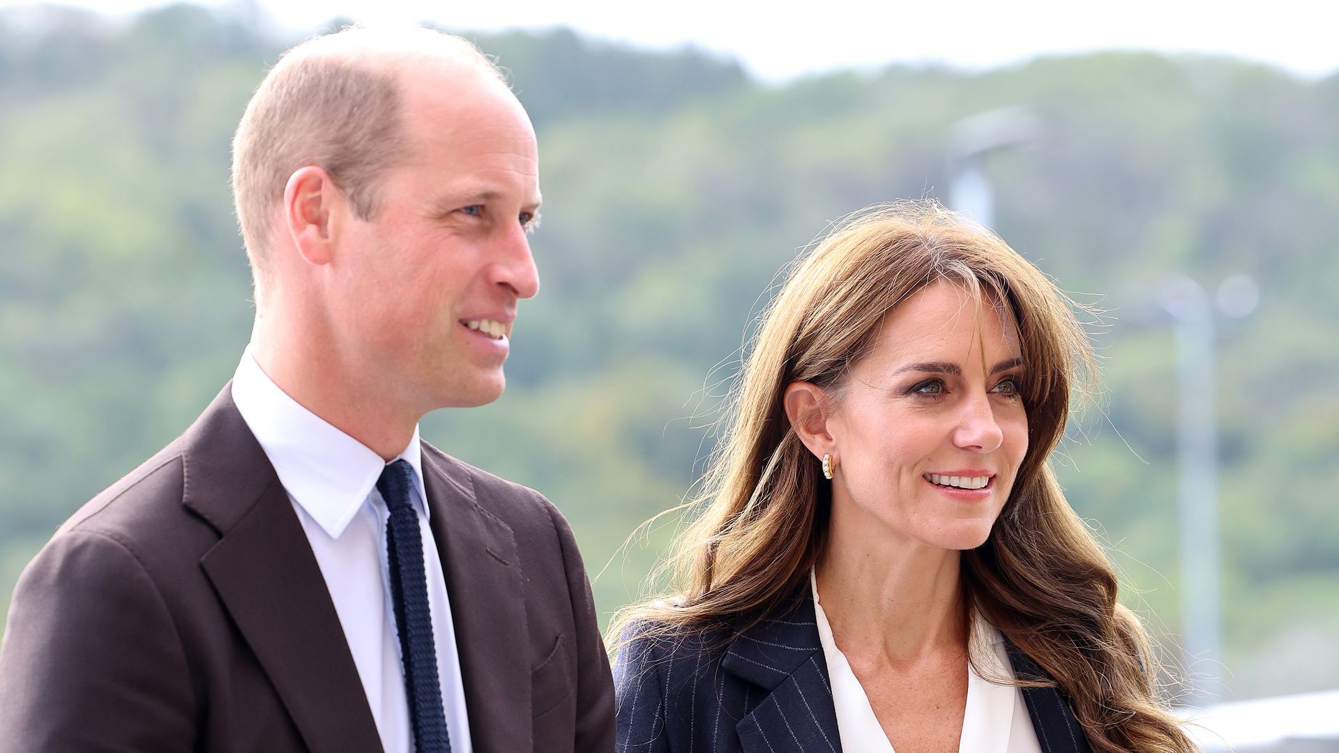 Prince William standing with Kate Middleton