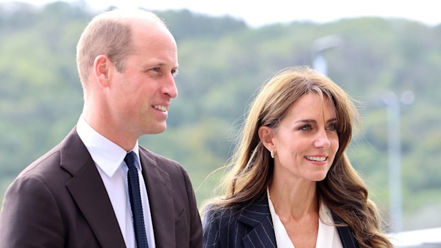 Prince William standing with Kate Middleton