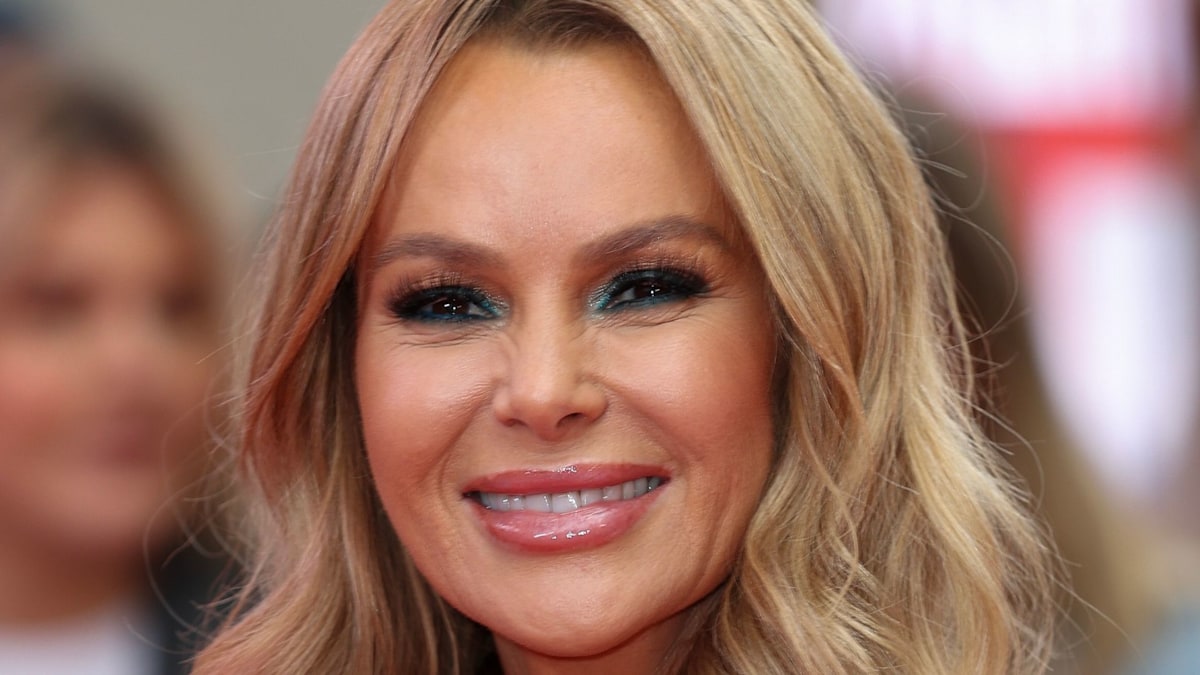 Amanda Holden is a tangerine dream in striking orange dress