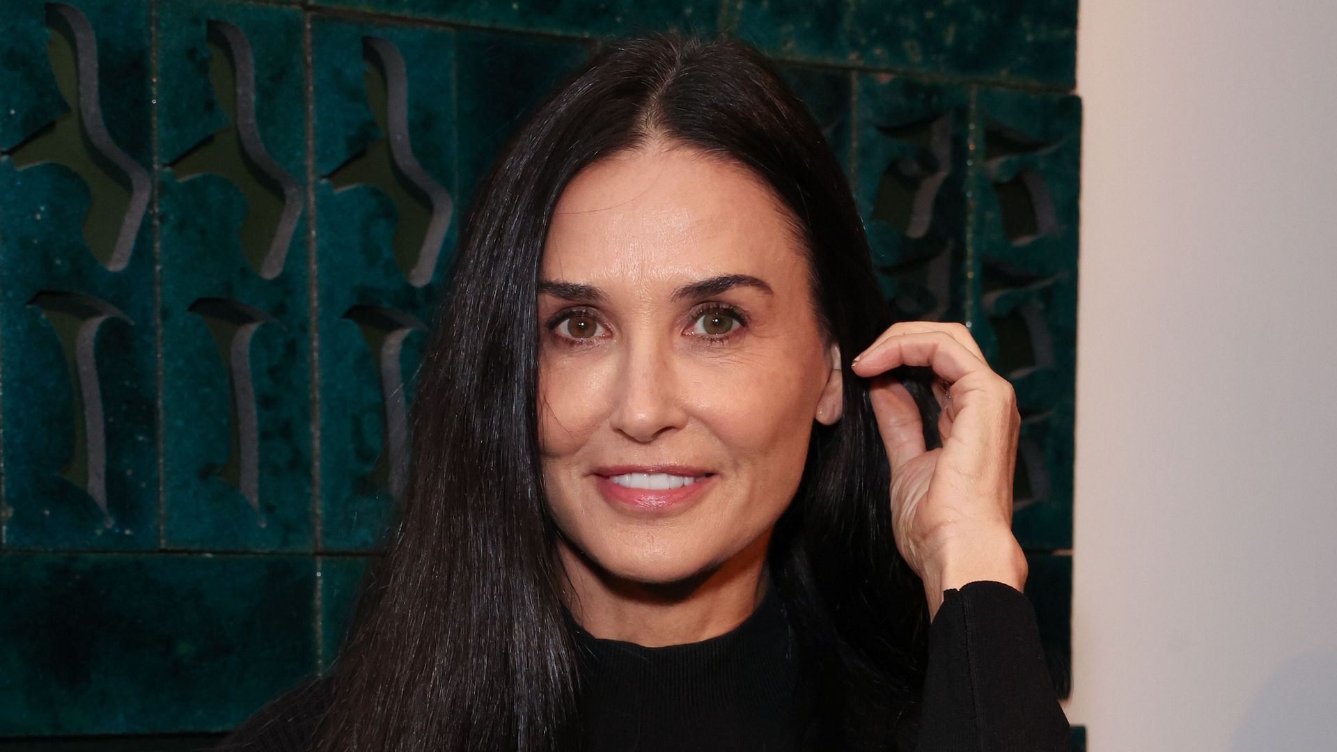 demi moore black dress frequency exhibition