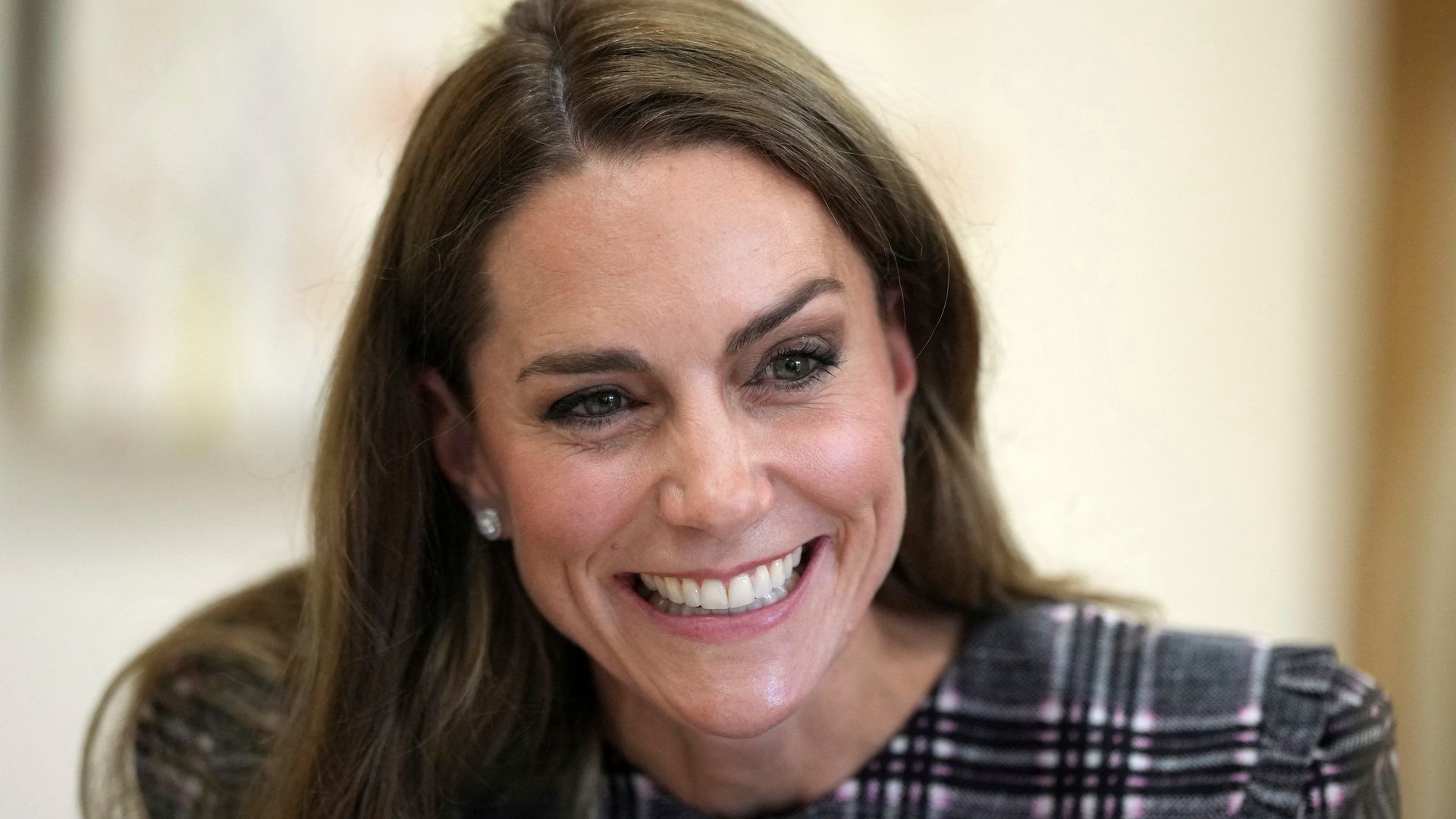 Kate Middleton, the Princess of Wales smiles during a visit with Prince William, at the National Federation of Women's Institute (WI) in Sunningdale, west of London on September 8, 2025
