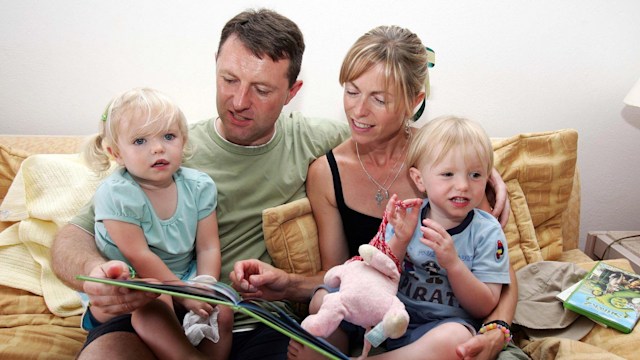 Gerry and Kate McCann are seen with their children Sean and Amelie in their appartment in Praia da Luz in Portugal 19 May 2007