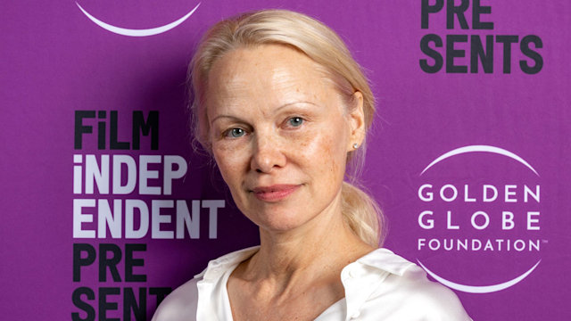 Pamela Anderson close up in white shirt with no ,makeup