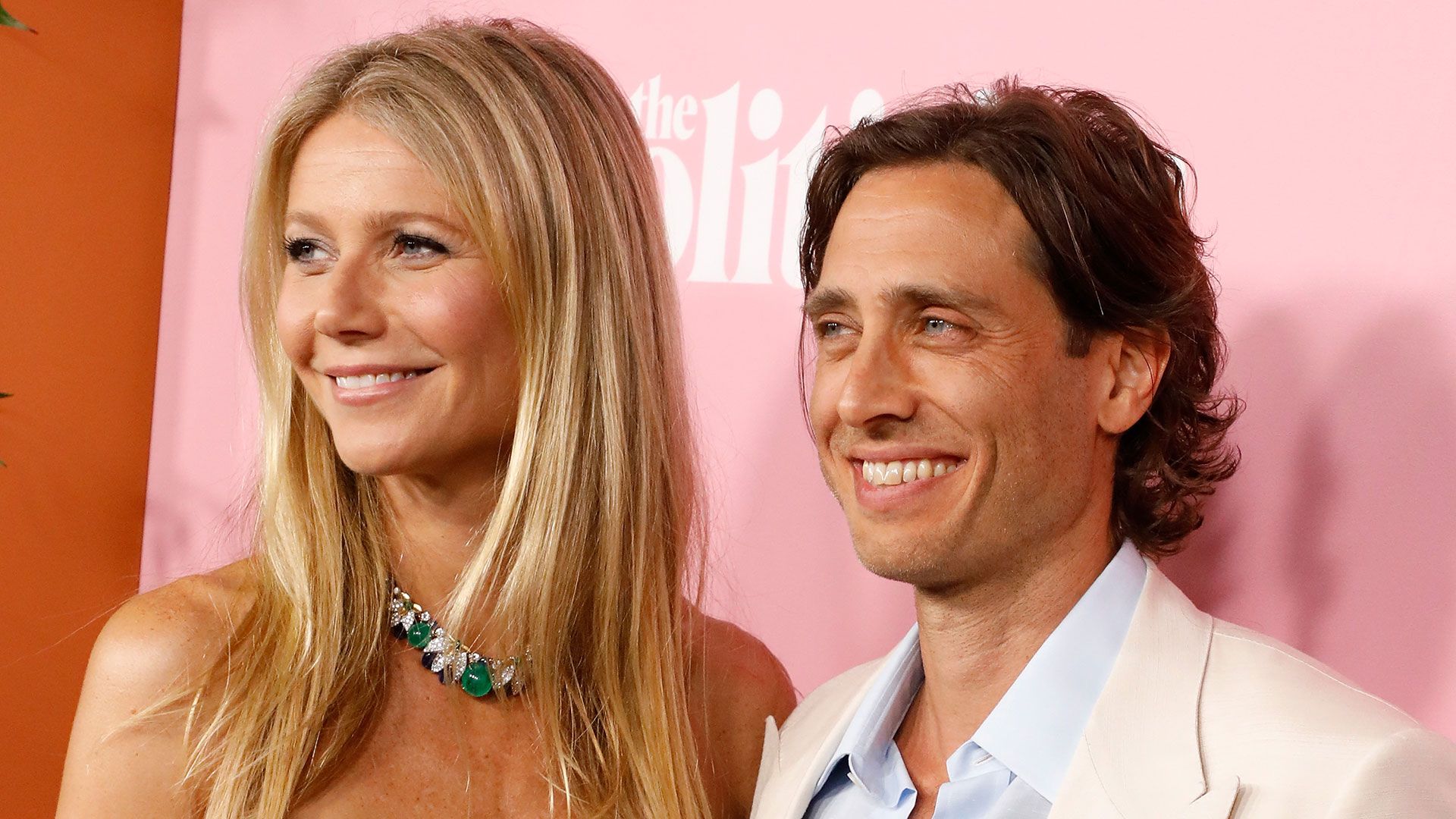 Gwyneth Paltrow and Brad Falchuk smiling at a premiere for The Politican