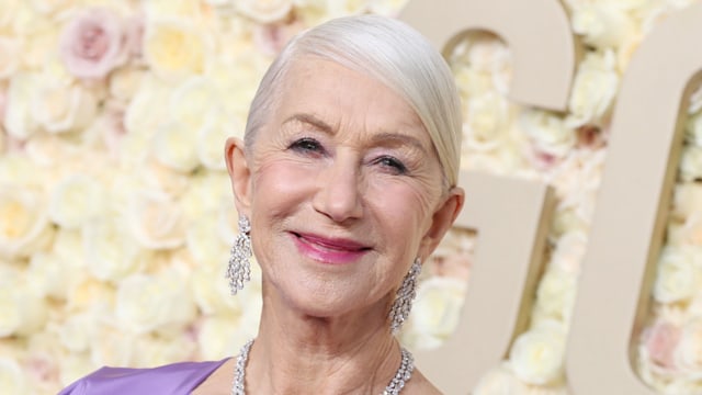 close-up of woman in purple dress smiling