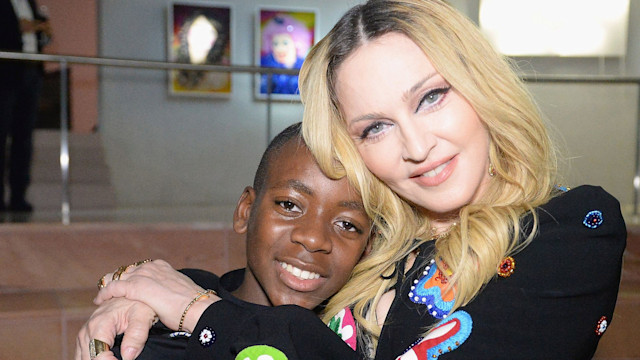 David Banda and Madonna at her Evening of Music, Art, Mischief and Performance to Benefit Raising Malawi at Faena Forum on December 3, 2016 in Miami Beach, Florida