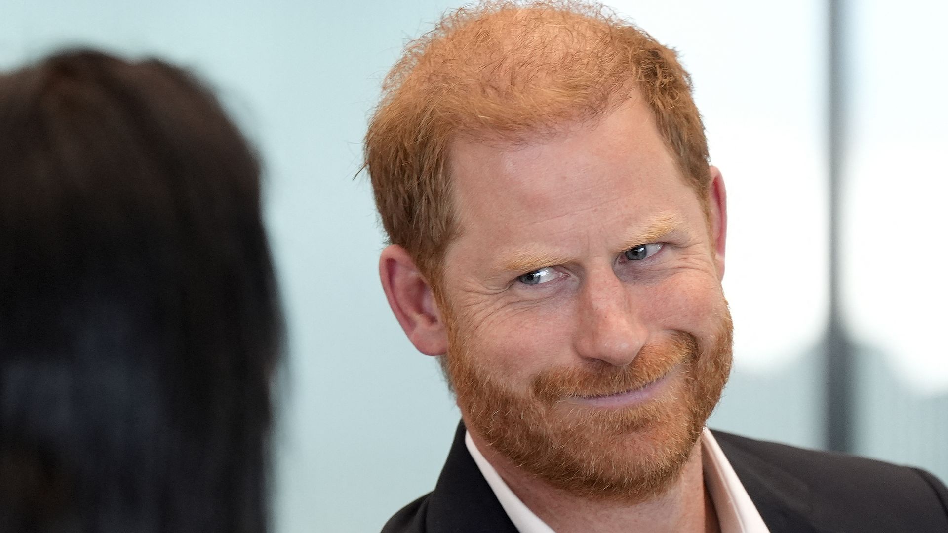 Britain's Prince Harry, Duke of Sussex, reacts as he takes part in a panel discussion on how social action positively impacts mental health, with four young people who are involved with The Diana Award, in central London on September 11, 2025. (Photo by Aaron Chown / POOL / AFP) (Photo by AARON CHOWN/POOL/AFP via Getty Images)          