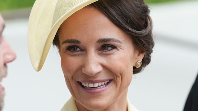 Pippa Middleton smiling in yellow hat