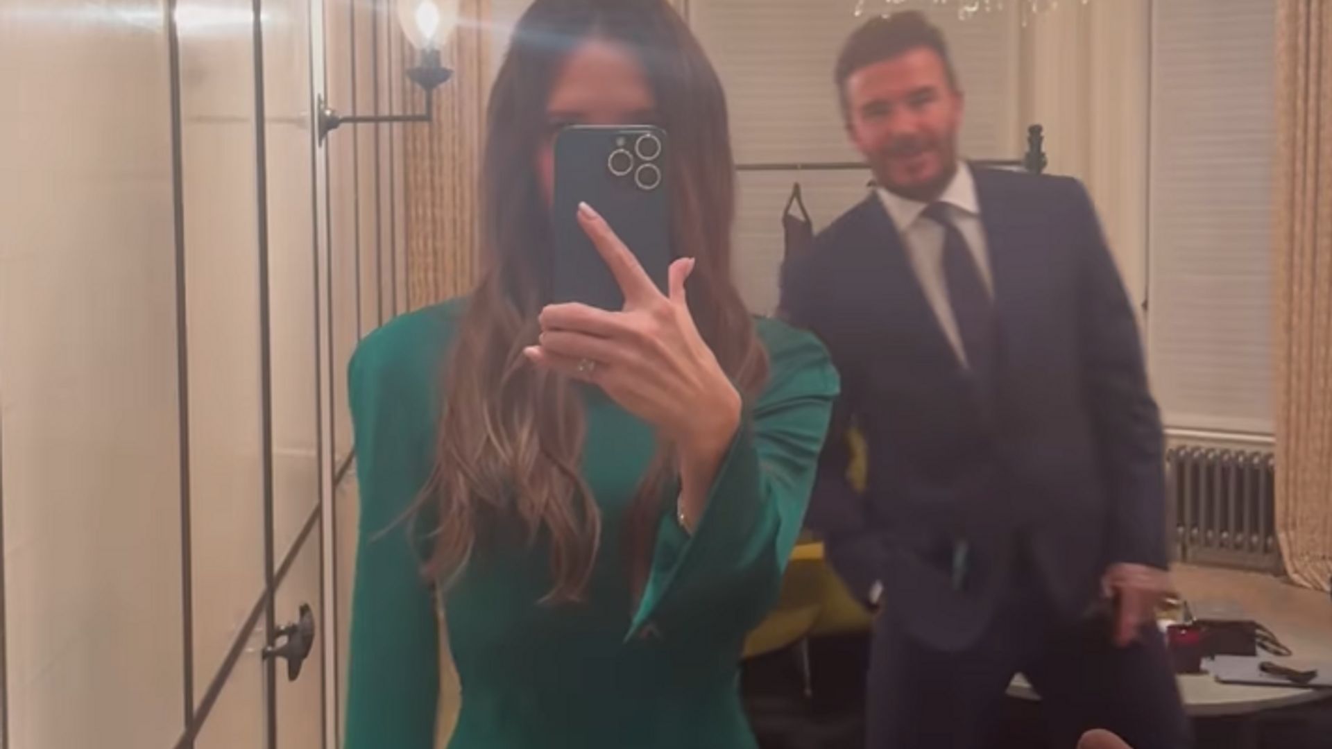 David Beckham photo bombs wife Victoria Beckham's NYE outfit video