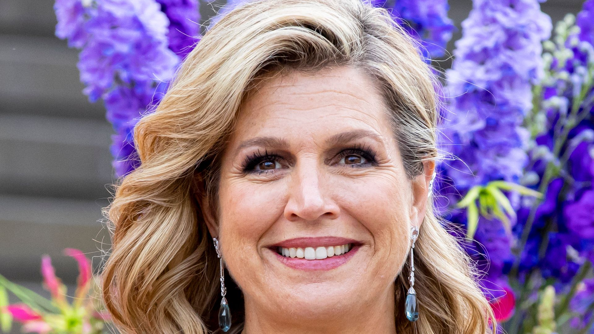 Queen Máxima is a vision in 10-year-old lace wedding guest dress