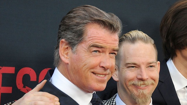 Pierce Brosnan and son Sean with their arms around each other