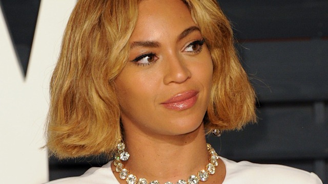 Beyonce in white dress with diamond choker