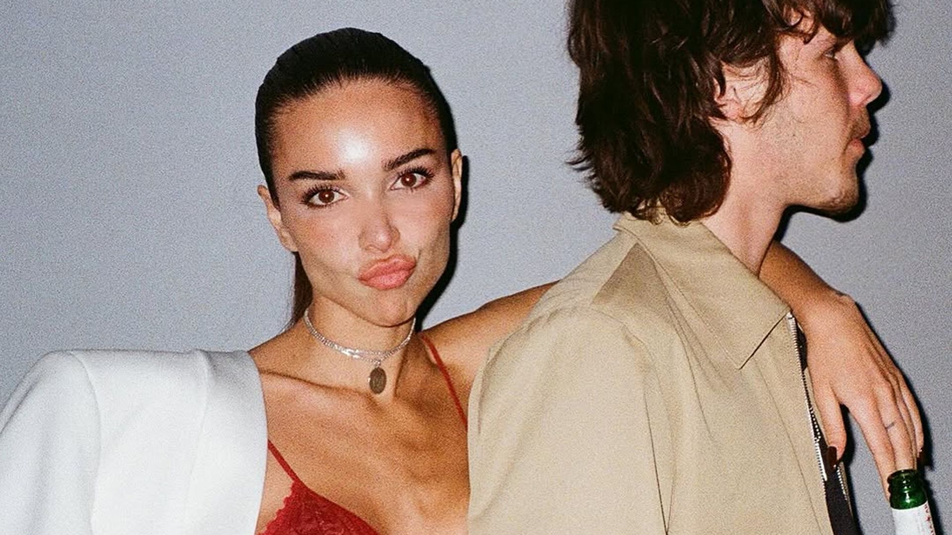 jackie apostel and cruz beckham in a grainy film image