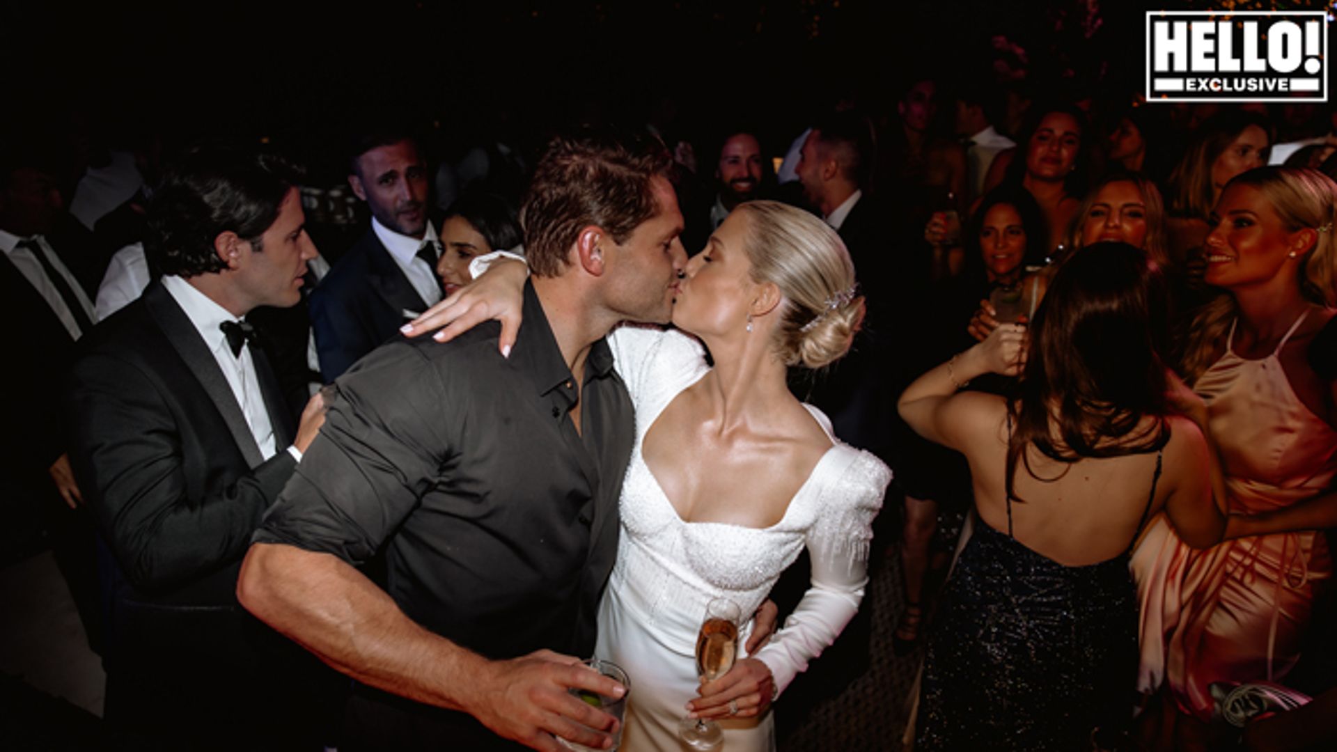 Lady Amelia Spencer kissing her new husband Greg Mallett on the dance floor at her wedding