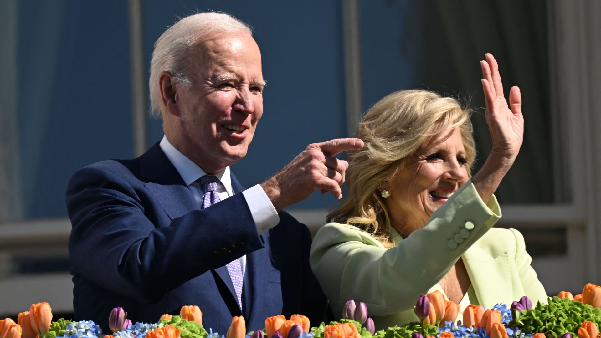 The First Lady Dr. Jill Biden and President Joe Biden waving from the White House