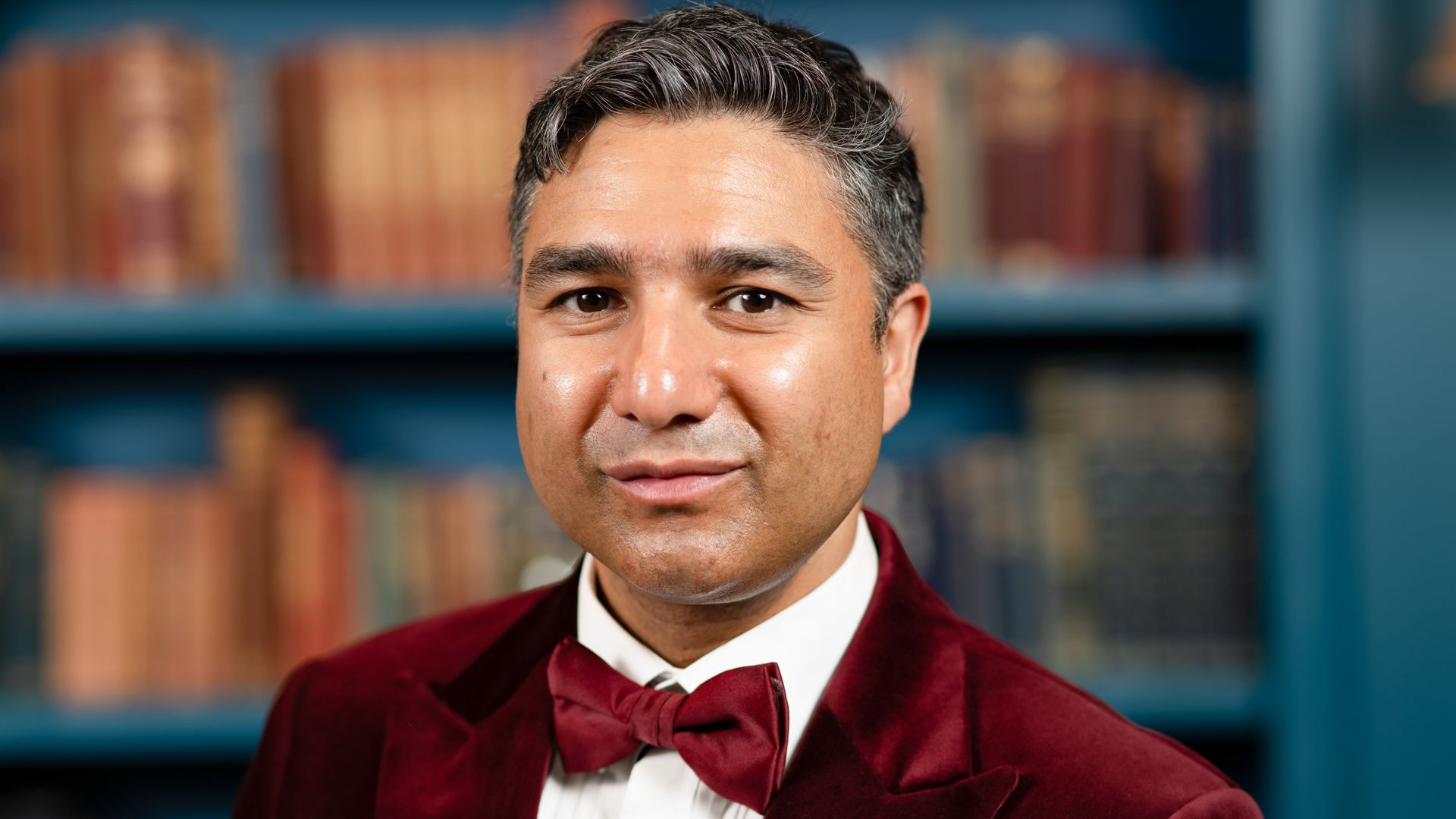 Nick Mohammed in a red tuxedo on The Celebrity Traitors