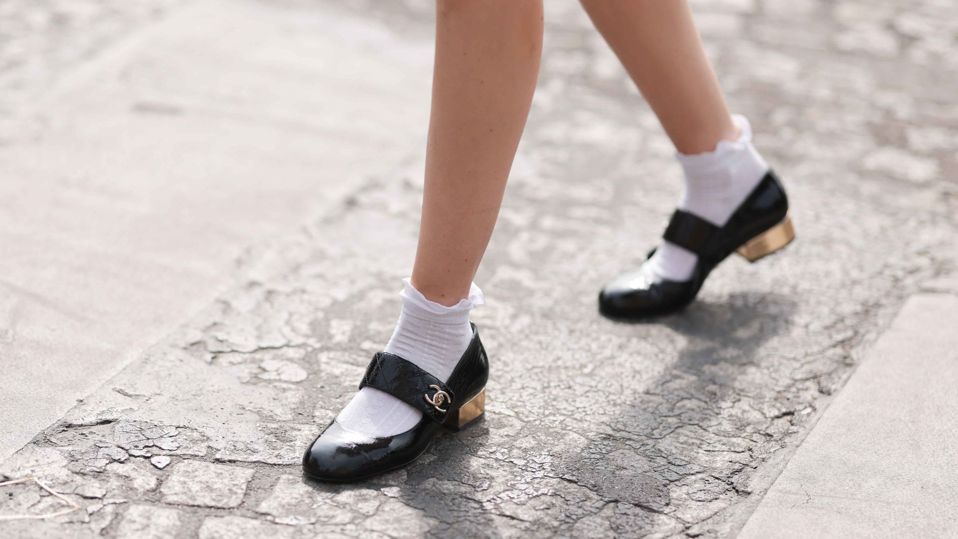 White lace socks in black loafers Parisian style detail