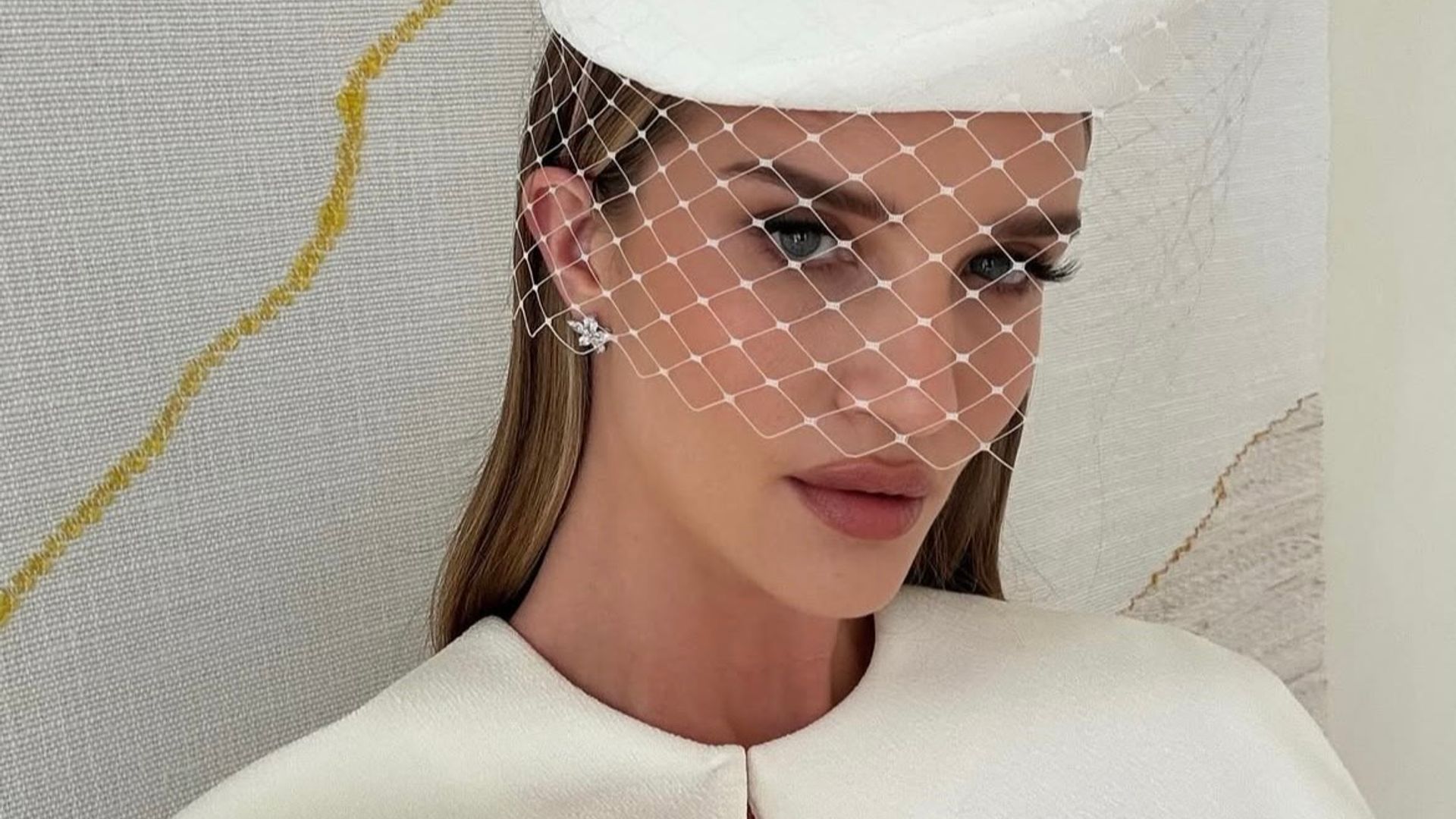 Rosie Huntington-Whiteley in white, netted fascinator 