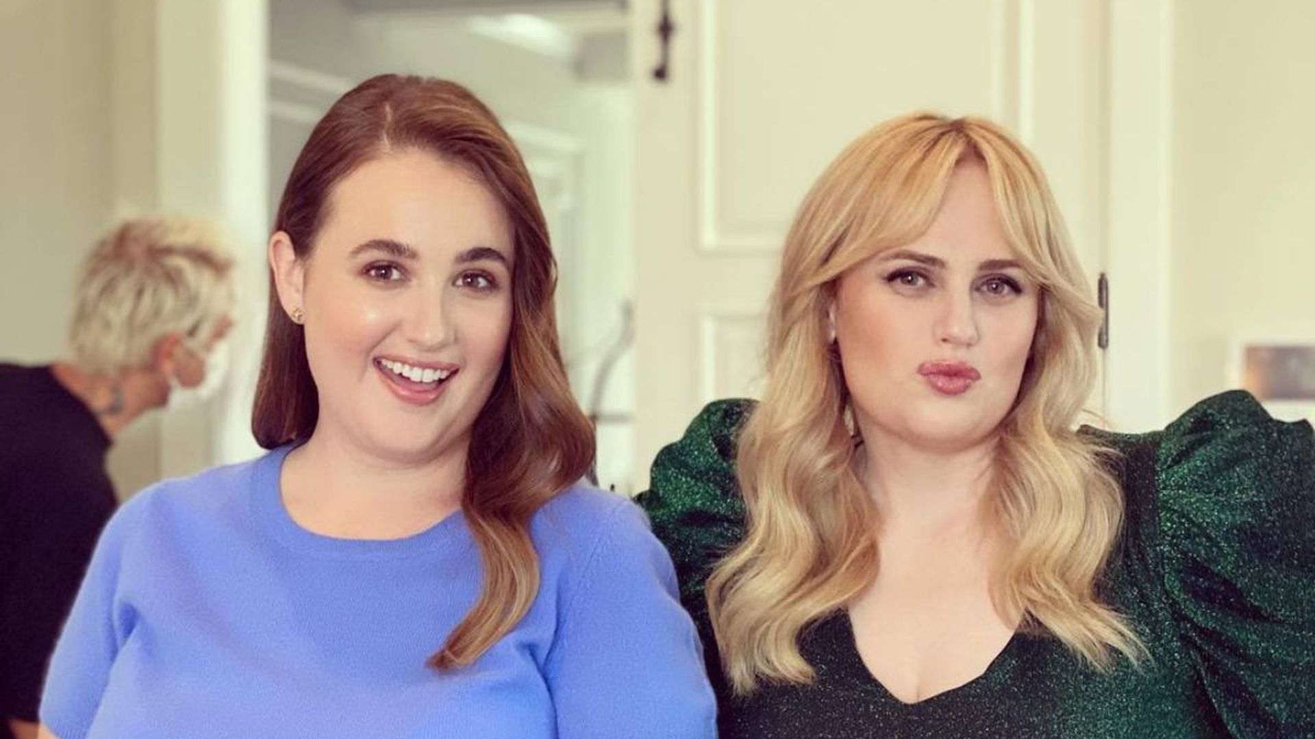 Rebel Wilson and lookalike sister wow in plunging green swimsuits