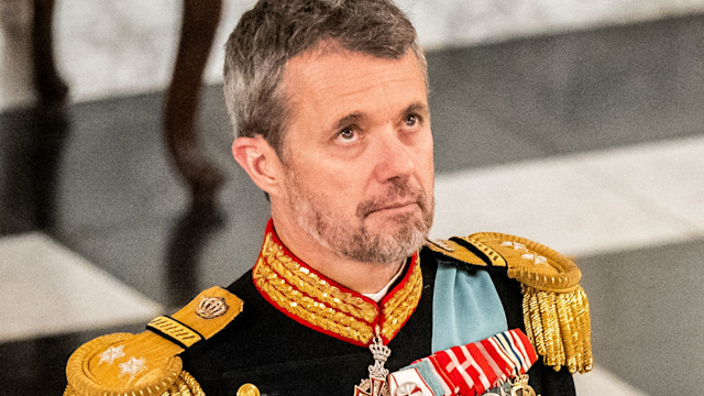 King Frederik of Denmark looking up while wearing military attire