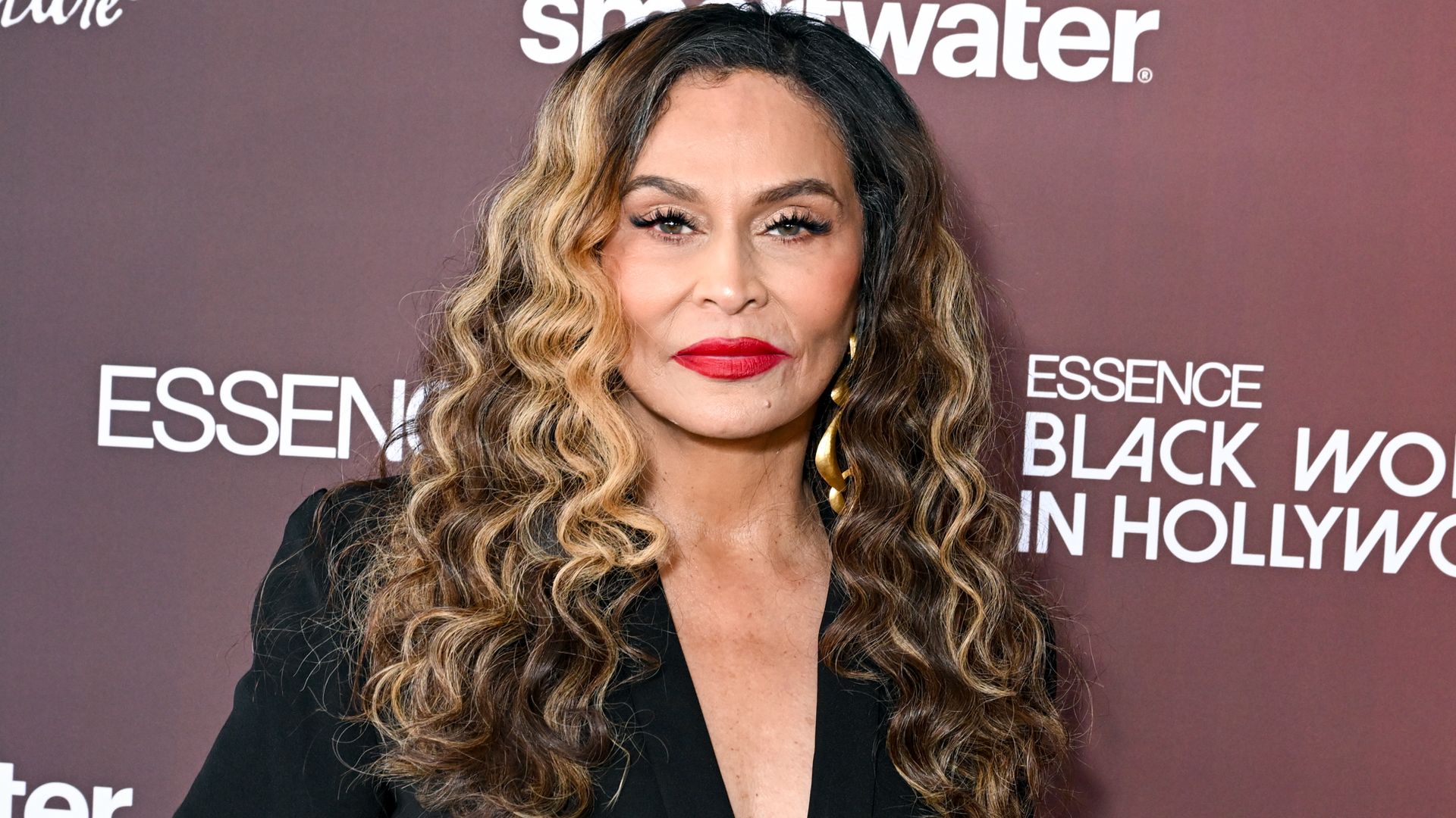 Beyoncé’s mom Tina Knowles stuns in figure-hugging suit for night out with granddaughter Blue Ivy