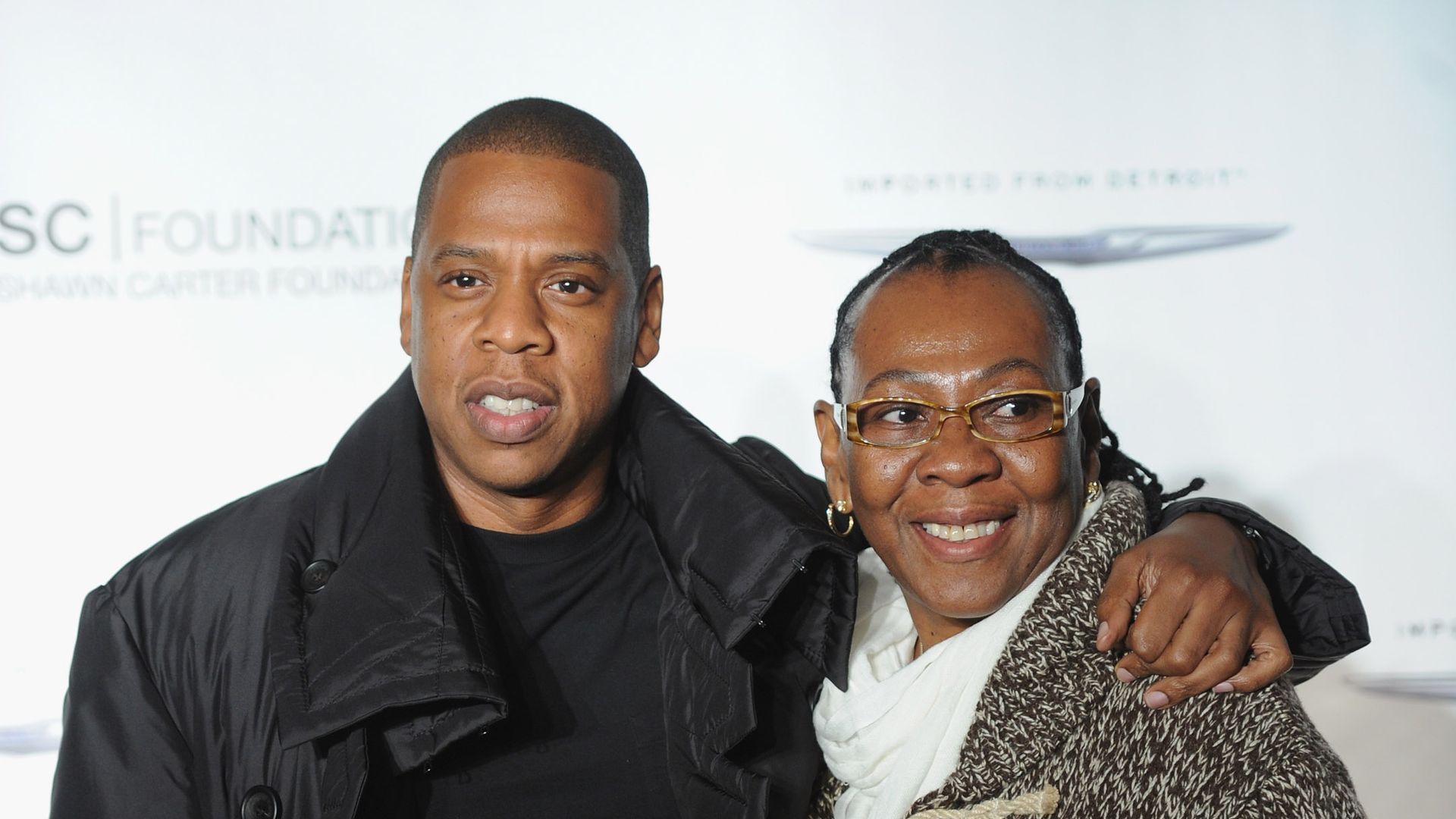 Jay-Z poses with his mother, Gloria Carter during an evening of "Making The Ordinary Extraordinary" hosted by The Shawn Carter Foundation at Pier 54 on September 29, 2011 in New York City