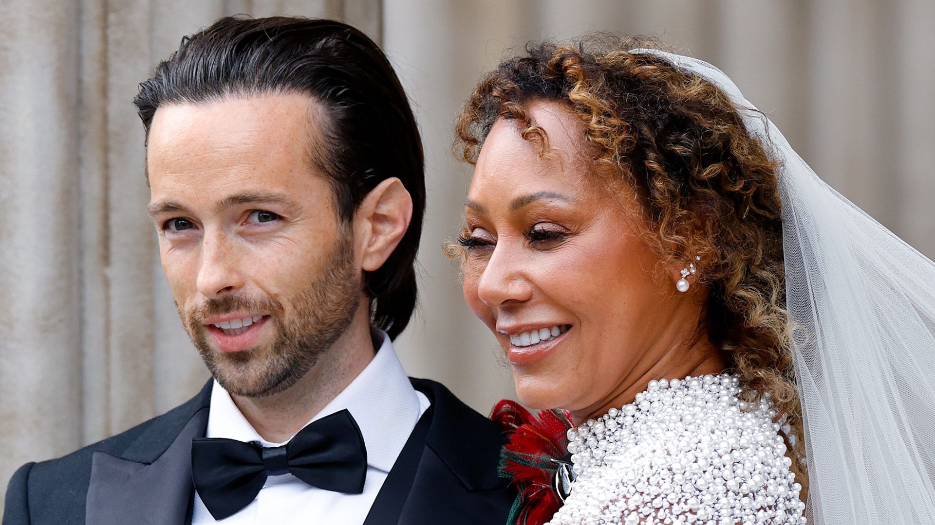 Rory McPhee and Mel B in suit and kilt and bridal gown