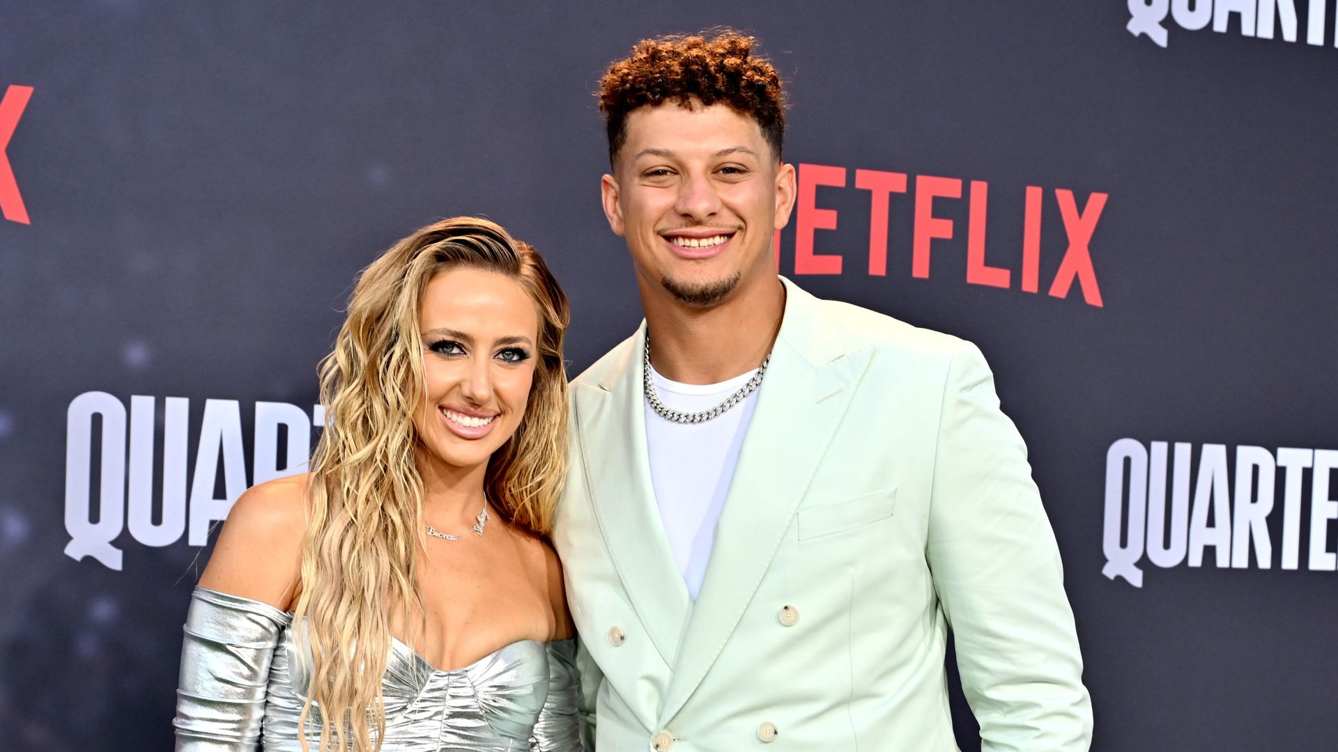 Patrick Mahomes' wife Brittany turns heads in cut-out red swimsuit ahead of Super Bowl 
