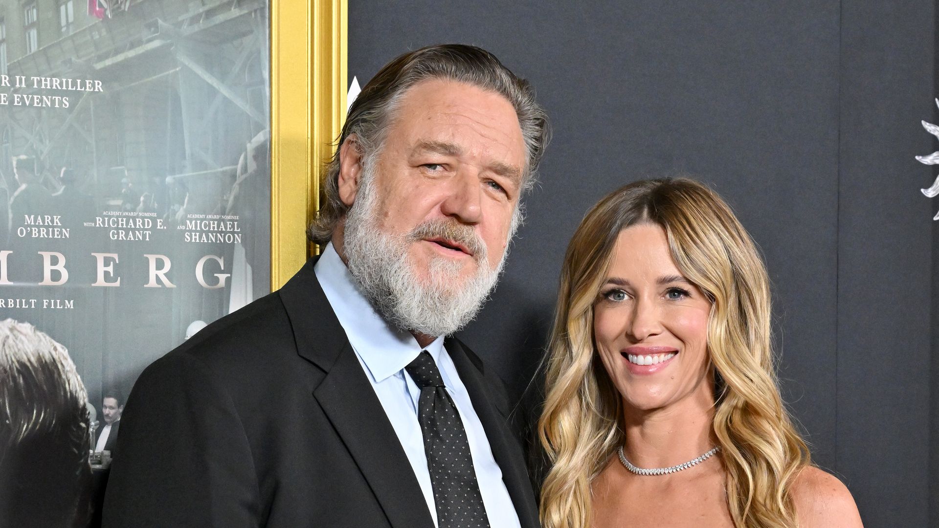 Russell Crowe and Britney Theriot attend the 2025 AFI FEST premiere for Nuremberg