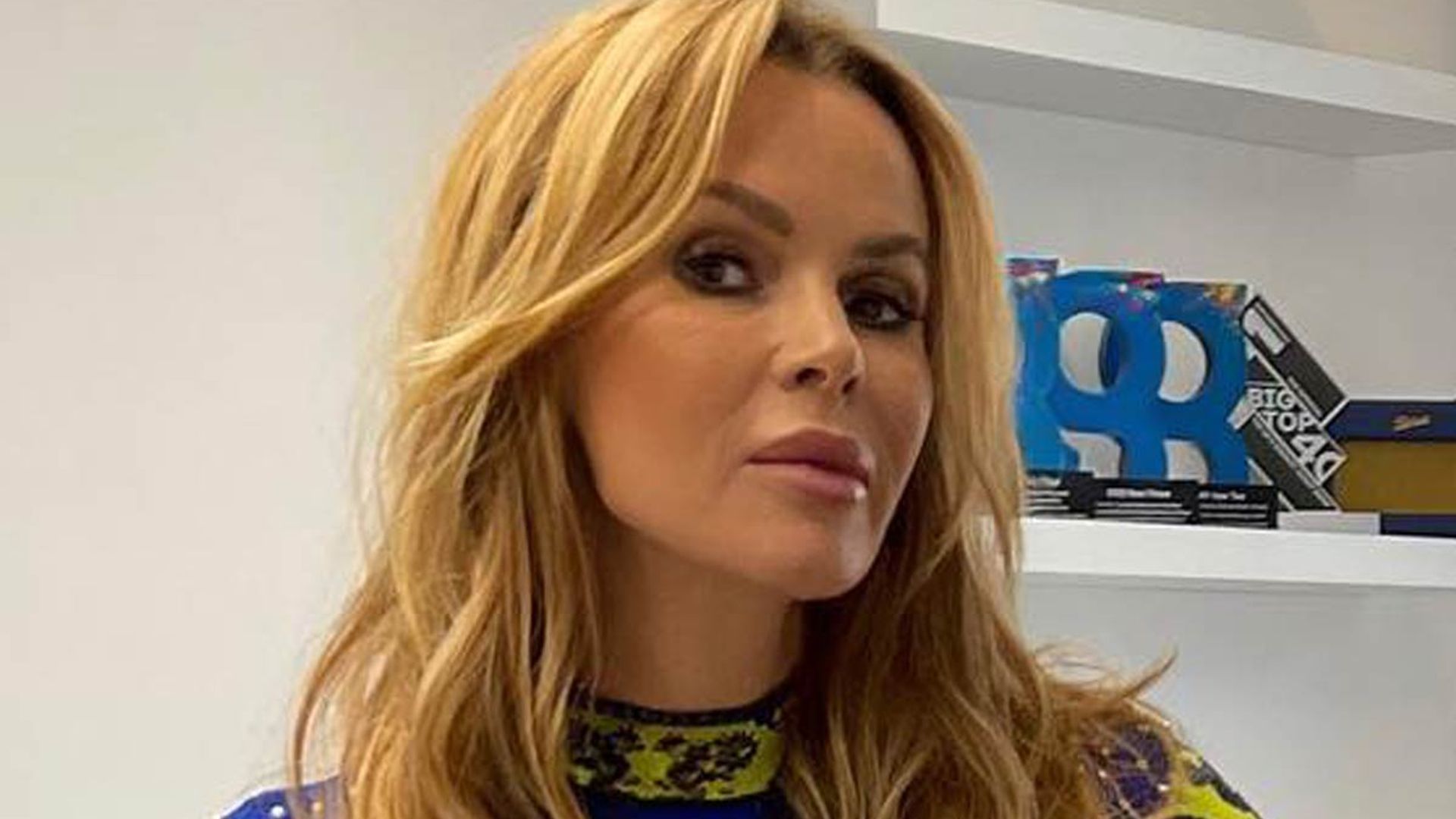 Amanda Holden looks unreal in thigh-high boots and velvet mini dress