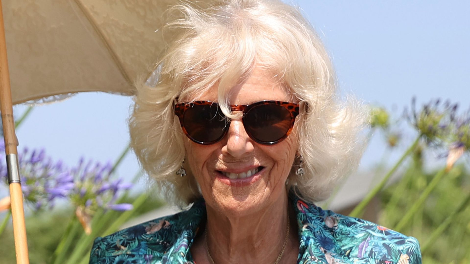 Duchess Camilla looks so chic in silky dress and shades as she