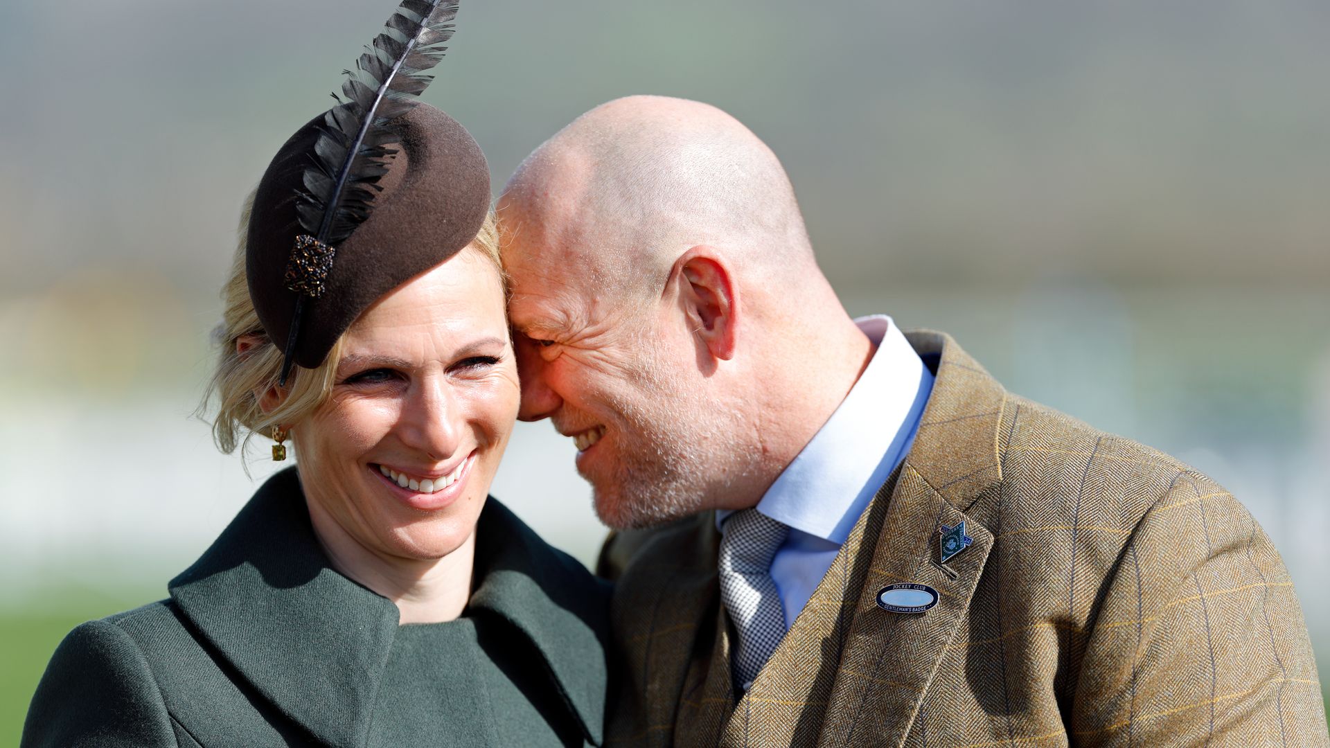 mike and zara tindall looking loved up at event