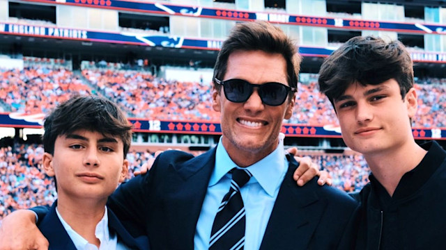 Tom Brady and his sons Jack and Benjamin photographed at his Patriots Hall of Fame induction ceremony