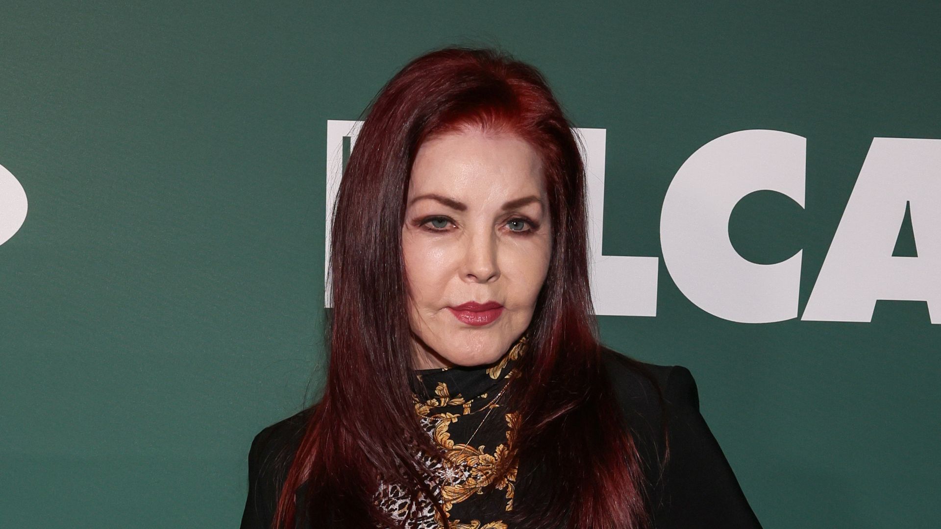 priscilla presley black outfit